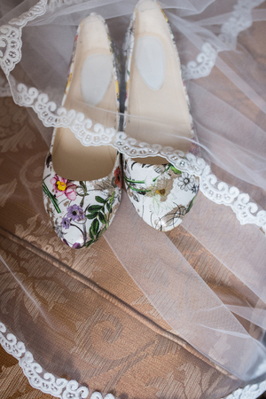 Shoes without heels with colorful flowers. Wedding shoesの写真素材