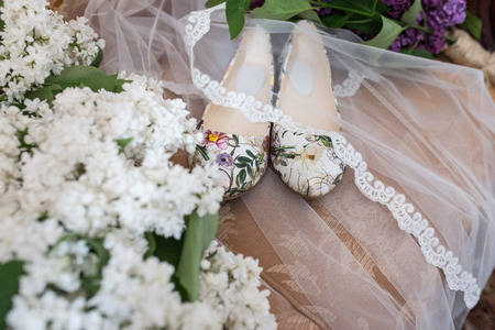 Shoes without heels with colorful flowers. Wedding shoesの写真素材