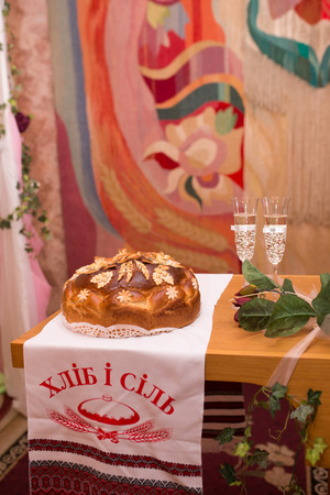 Closeup wedding loaf with flowers on a table. Wedding bread.の写真素材