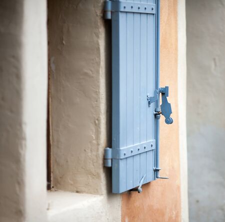 Traditional window shutters in Menerbes, Provence, Franceの写真素材