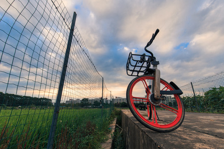 bike beside farmlandのeditorial素材
