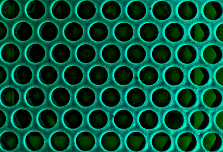 Background of plastic holesの写真素材