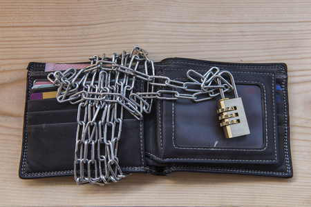 wallet With lock and chain locks Tightly guardの写真素材