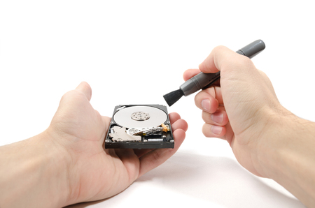Disassembled hard disc cleaning brush isolated on whiteの写真素材