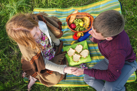 Young married couple on picnic outdoorsの写真素材