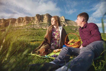 Young married couple on picnic outdoorsの写真素材
