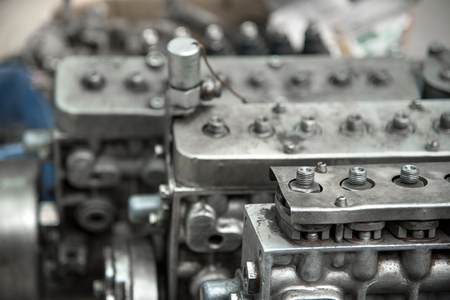 Old high-pressure diesel pump. The shallow depth of the sharply depicted space