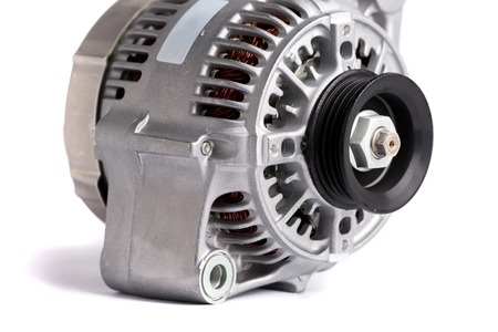 New car power generator, isolated on white background. Details of the engine of the car.の写真素材