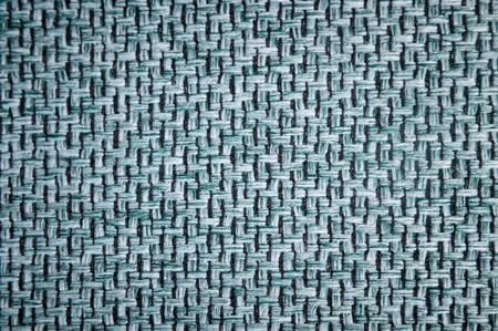 Textured background surface of textile upholstery furniture close-up. gray blue Color fabric...