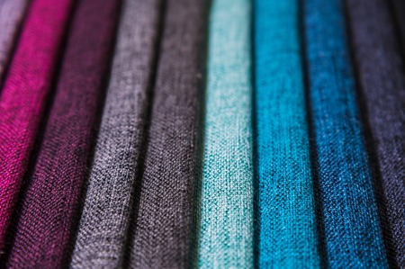 A set of samples of fabric furniture decoration lines of textile textures. Multicolored stripes upholstery. Mode and tone for a luxurious interior style. Abstract backgroundの写真素材