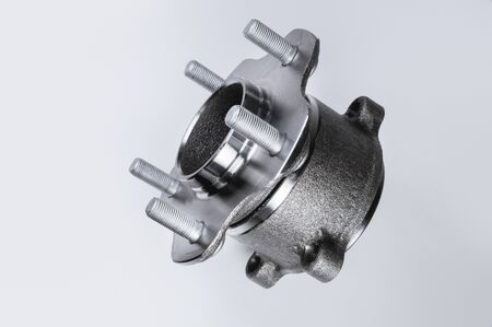 New Wheel hub assembly with bearing. This is part of the car suspension on a gray background with a...