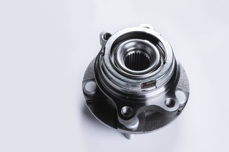 New Wheel hub assembly with bearing. This is part of the car suspension on a gray background with a...