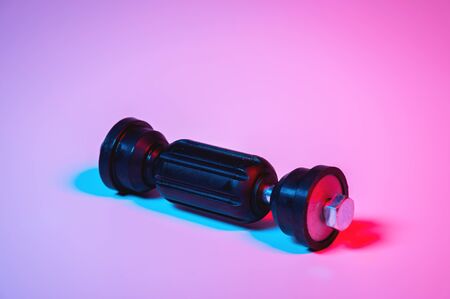 Car front suspension anti-roll bar mount. New tie rod in double red-blue lightの写真素材