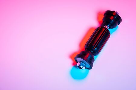 Car front suspension anti-roll bar mount. New tie rod in double red-blue lightの写真素材