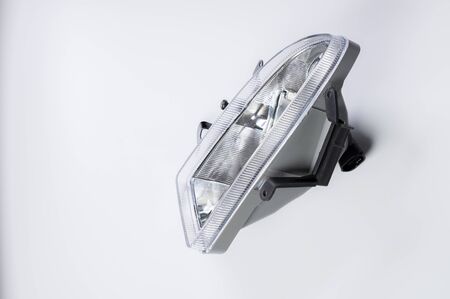 New spare parts for the car. Recessed fog lamp on a gray background.の写真素材