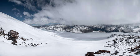 Panorama Winter snow-capped mountain peaks in Europe in the North Caucasus. Great place for winter...