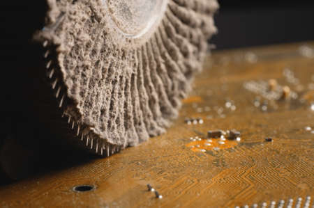 Close-up macro of dusty and dirty heatsink on cpu cooler pc