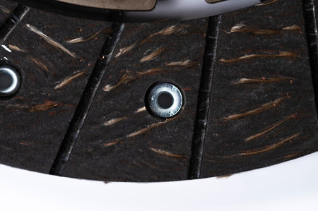 Close-up on the new clutch disc. Background preparation for repairs of the chassis and gearbox