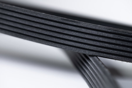 New belt for automobile poly-V-belt electricity generator. Macro close-up blank for backgroundの写真素材