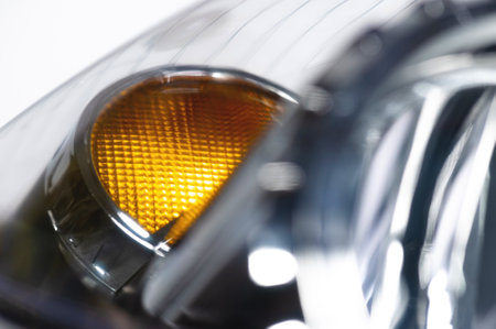 Macro close-up element of reflector of new headlight of car headlight in defocus. Car background with soft focusの写真素材