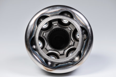 Close-up of a new CV joint on a gray background. Car suspension partsの写真素材