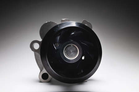 New ICE water cooling pump in contrasting light on a gradient background