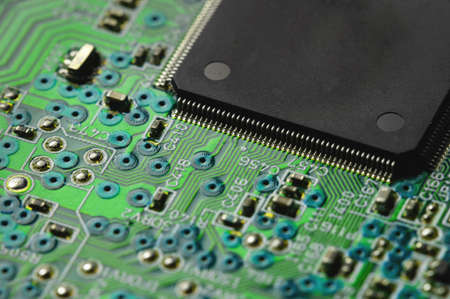 Green electronic board with radioelements close-up. Background for the theme of electronics and high...