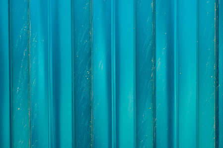 metal turquoise rusty ribbed fence, texture, copy spaceの写真素材