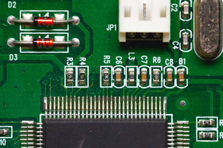 Close-up of a factory printed circuit board of electronics with pin tracks. Electronic background...