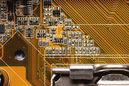 close-up of a printed circuit board with microchips and radio parts with a processor. Background for electronicsの写真素材