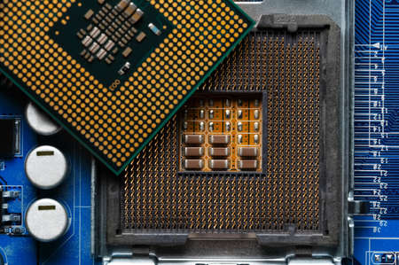 close-up of a printed circuit board with microchips and radio parts with a processor. Background for...