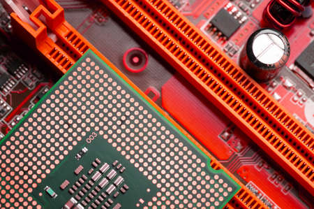 close-up of a printed circuit board with microchips and radio parts with a processor. Background for...