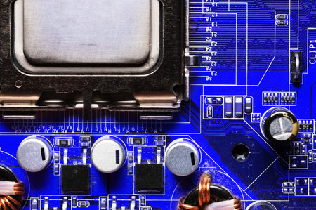 close-up of a printed circuit board with microchips and radio parts with a processor. Background for...
