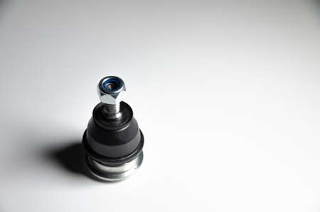 ball joints of the front suspension of a passenger car on a gray background. Service and new partsの写真素材