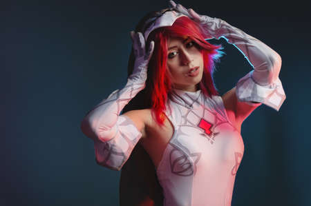 Cosplay portrait of attractive sexy Caucasian young woman in manga anime costume. Portrait of a costume character rosaryの写真素材