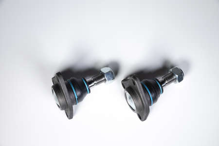 two New ball joint with rubber black boot on gray gradient backgroundの写真素材