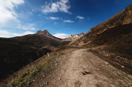 Autumn day on a scenic but difficult 4X4 track located in front of the summit. Off-road, wide angle