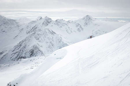 Caucasus Mountains, Panoramic view of the ski slope on the horizの写真素材