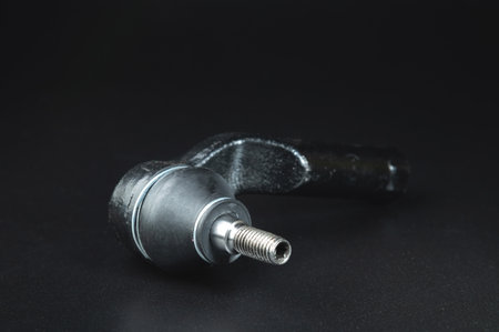 Close-up of Tie Rod or Ball Joints. New spare part for steering tie rod. Trade in spare parts or car...