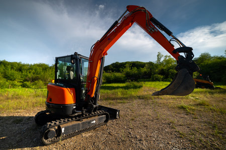 Small-sized construction special equipment in a natural location. The concept of using not full-size...