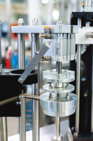 Stainless steel production elements in equipment manufacturing. Metal parts of future production systemsの写真素材