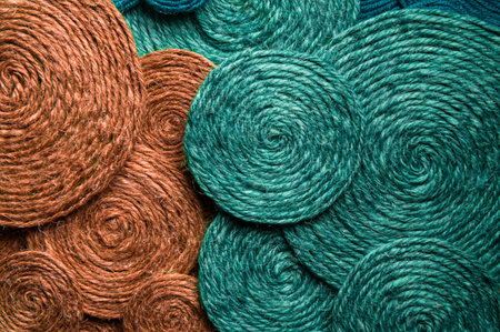Green and red background made of hard woolen textile material close-up. Fabric with natural texture....