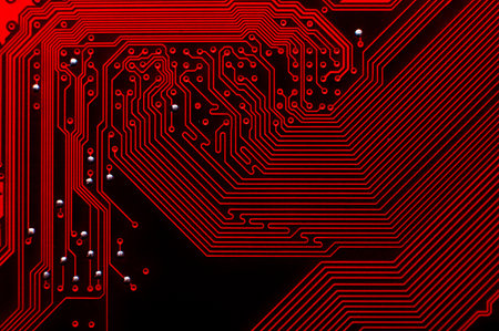 Top view of a computer plate as a background. Macro shot of a printed circuit board, paths are...