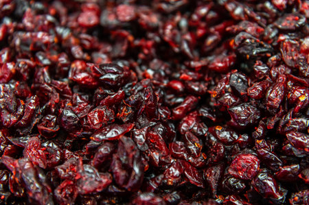 A variety of dried, pitted cherries. Dried cherries on a store shelf. Delicious, healthy food and...