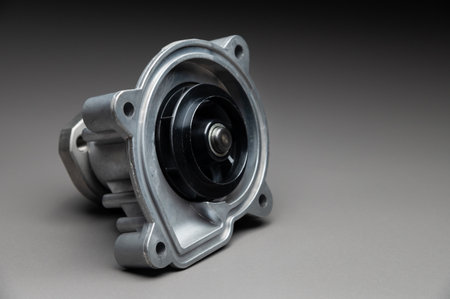 New cooling pump for internal combustion engine of a passenger car on a gray background