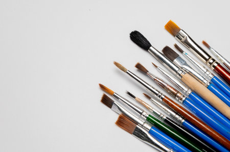 Many different brushes on a white background. Copy space for artistic background.の写真素材