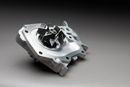 High-quality spare parts for your car. Car maintenance. New water pump for the engine cooling system...