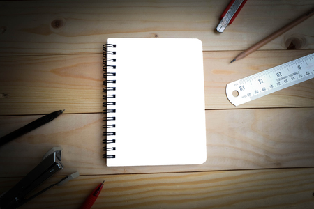 Notebook, pencil, pens, clippers, cutter blade and rulerの写真素材