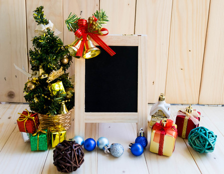 Blank blackboard with Christmas tree and ornaments