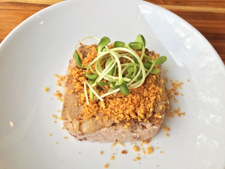 Healthy roasted pork on brown rice with sunflower bean sprouts on topの素材